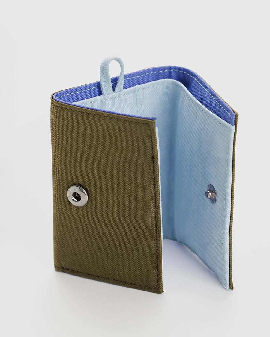 light blue and periwinkle interior of dark brown snap wallet