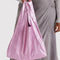model carrying blush metallic standard baggu