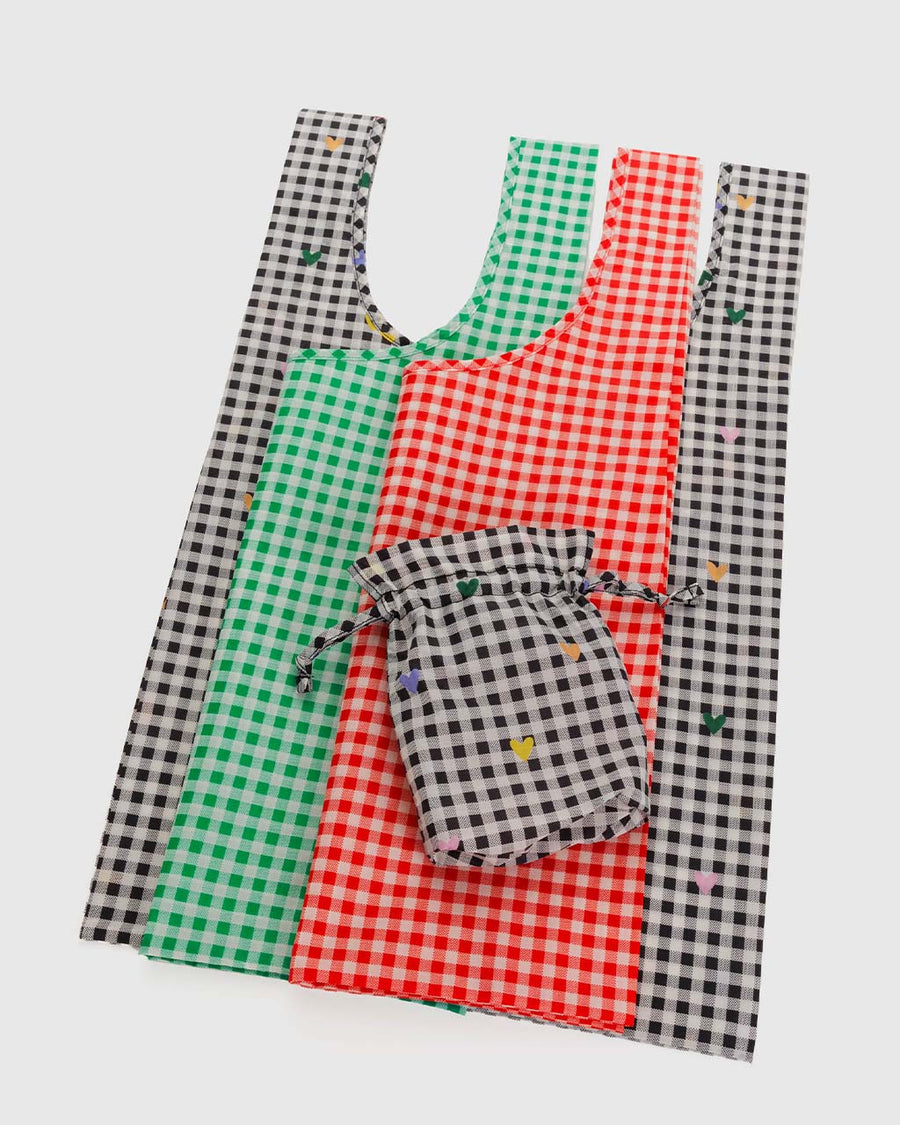 packaged set of three standard baggus: in black, green and red gingham prints
