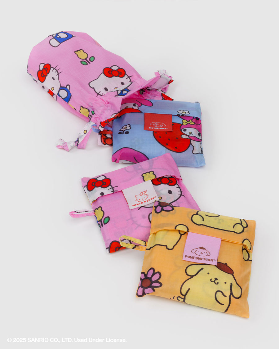 packaged pink hello kitty, light blue my melody and yellow pompompurin set of 3 standard baggu set