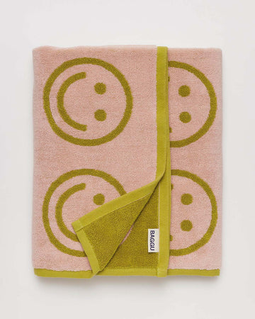 light pink and ochre smiley towel