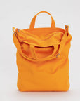 top zipper of bright orange canvas bag