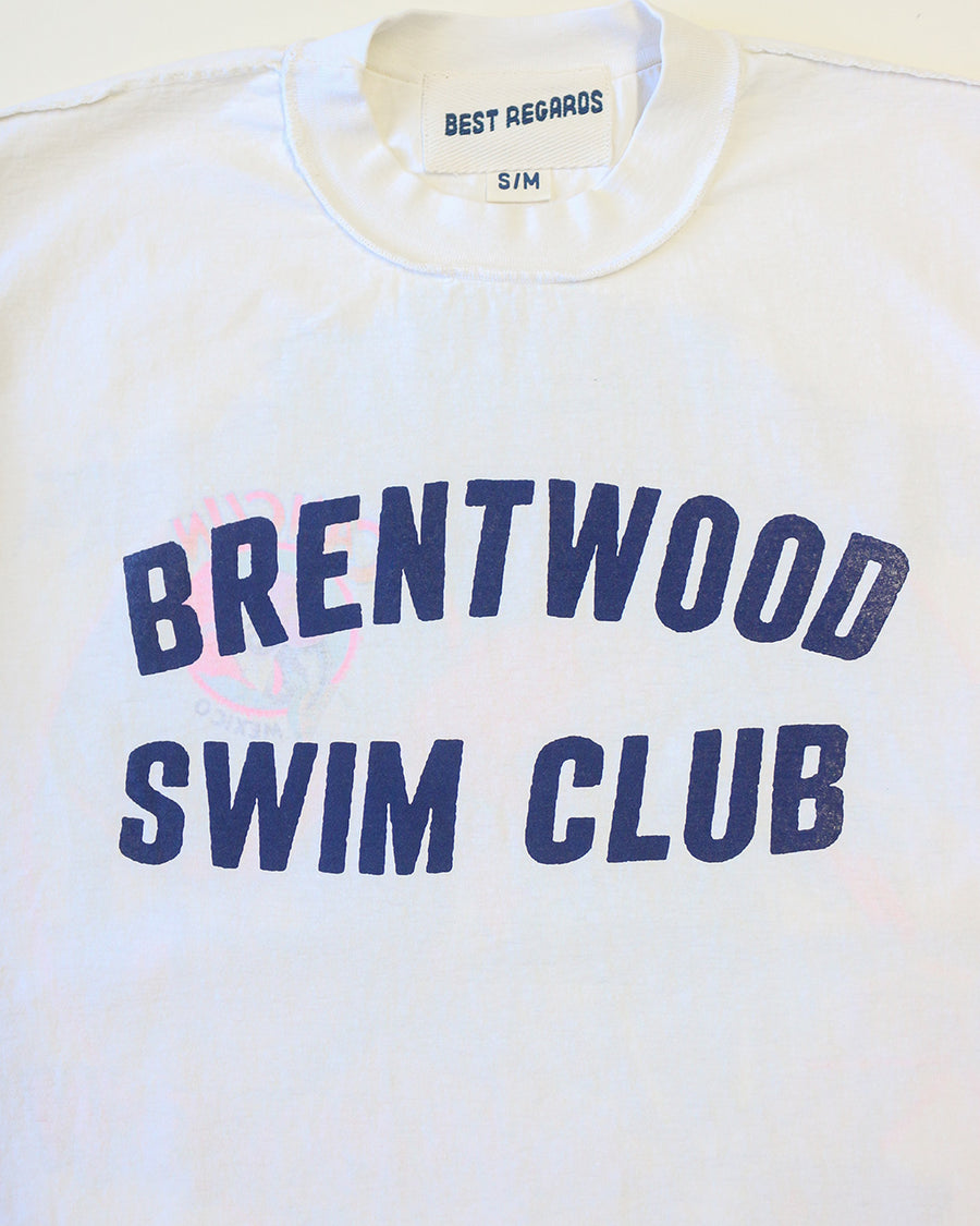up close of white tee with navy 'BRENTWOOD SWIM CLUB' across the front