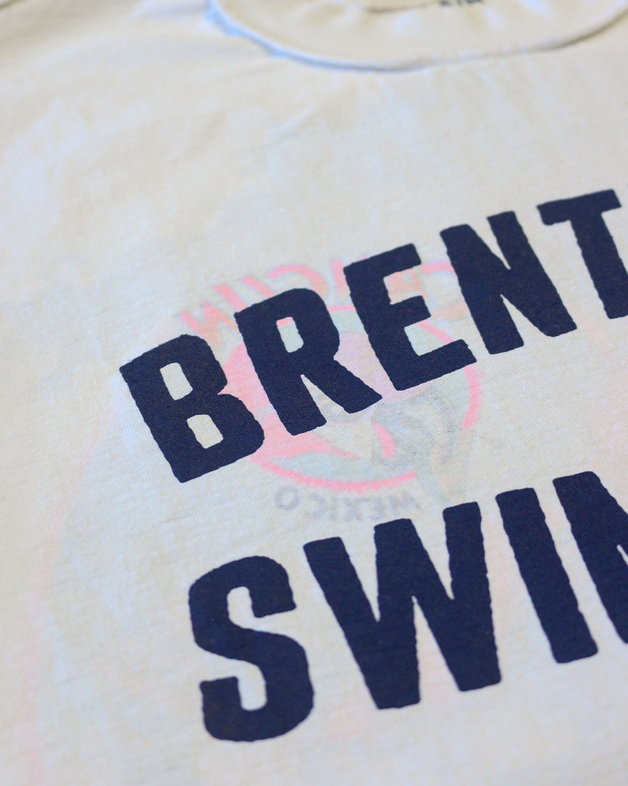 up close of white tee with navy 'BRENTWOOD SWIM CLUB' across the front