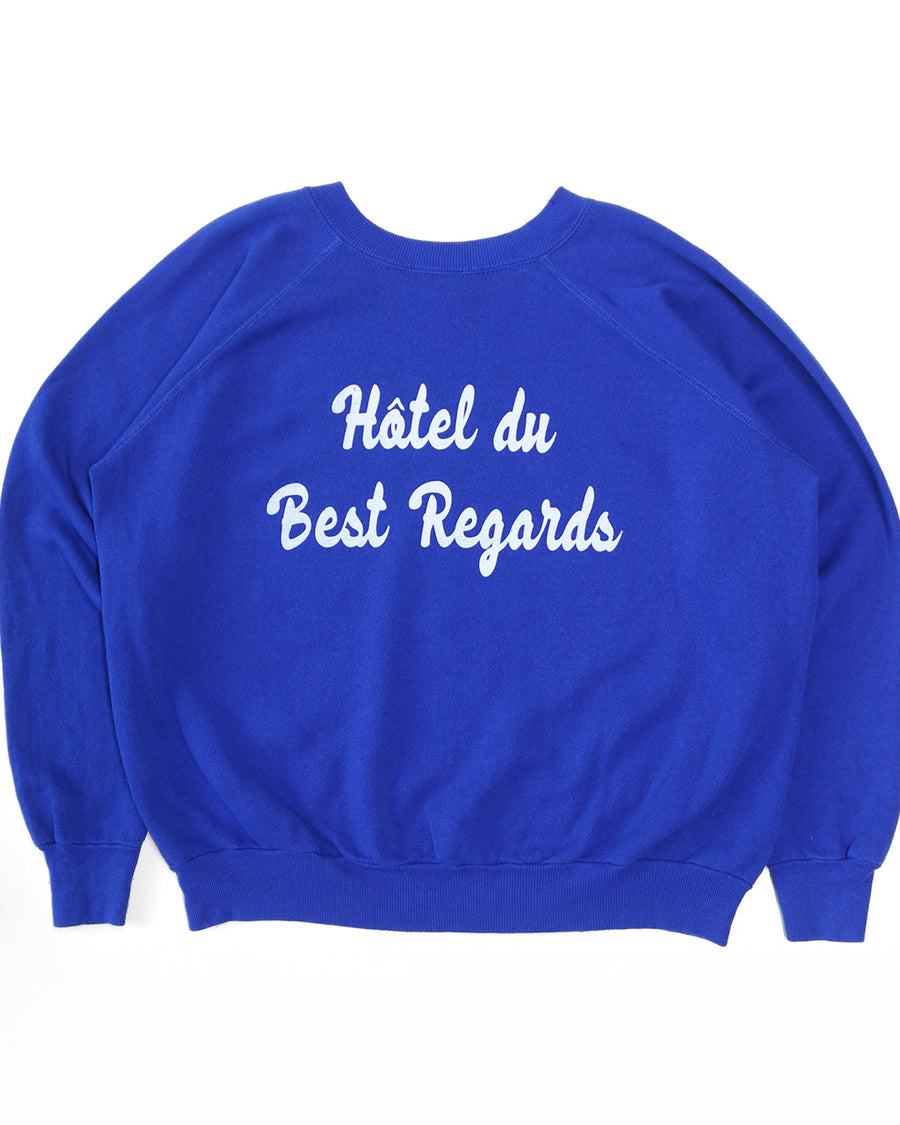 royal blue sweatshirt with white 'Hotel du Best Regards' across the front