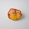red pin with gold lettering 'EMOTIONAL SUPPORT DOG' and hot dog graphic