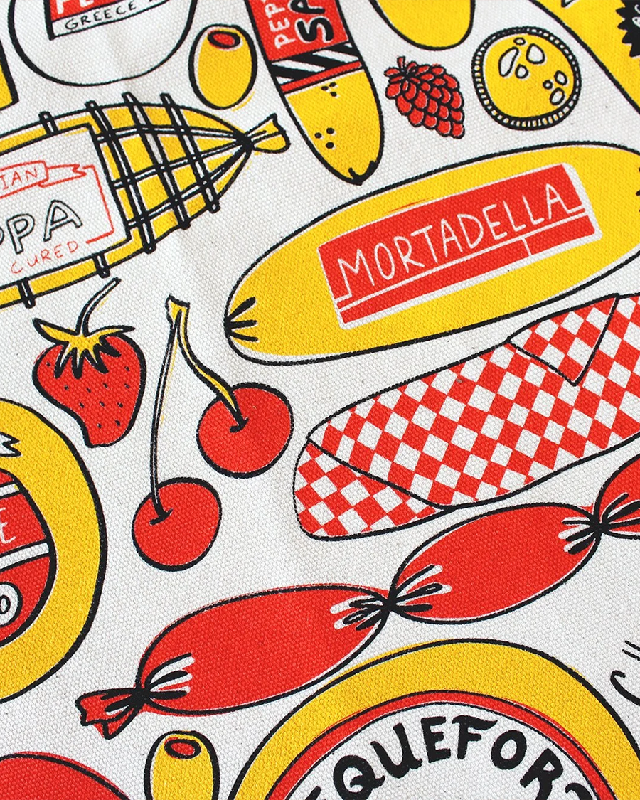 up close of canvas tote bag with various deli meats and cheese print
