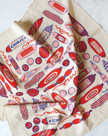 cream tea towel with red/pink pepperoni print