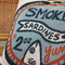 up close of blue and orange 'smoked sardines' can throw pillow