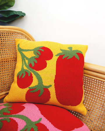 yellow knit throw pillow with tomato print