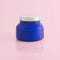 back view of 19 oz. aloha orchid candle in a sapphire blue jar