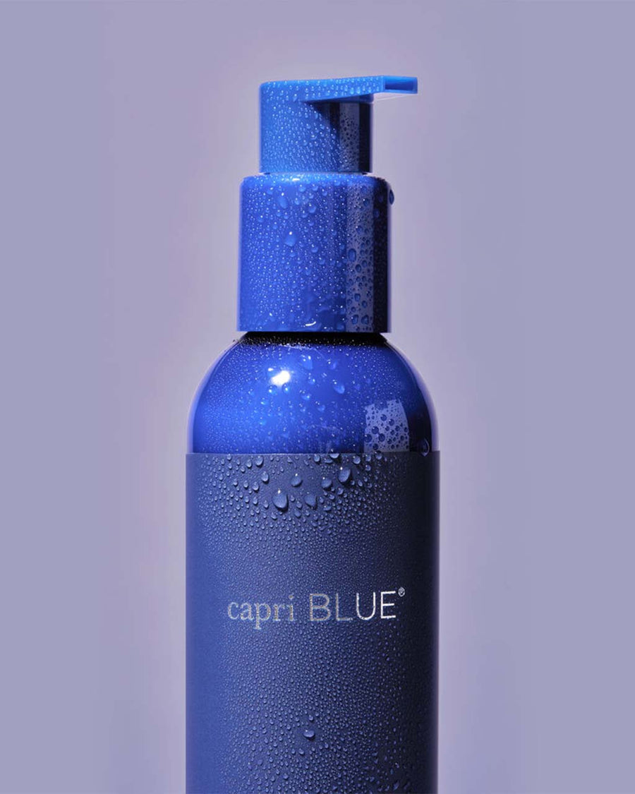 up close of 7.75 fl oz bottle of capri blue volcano body serum