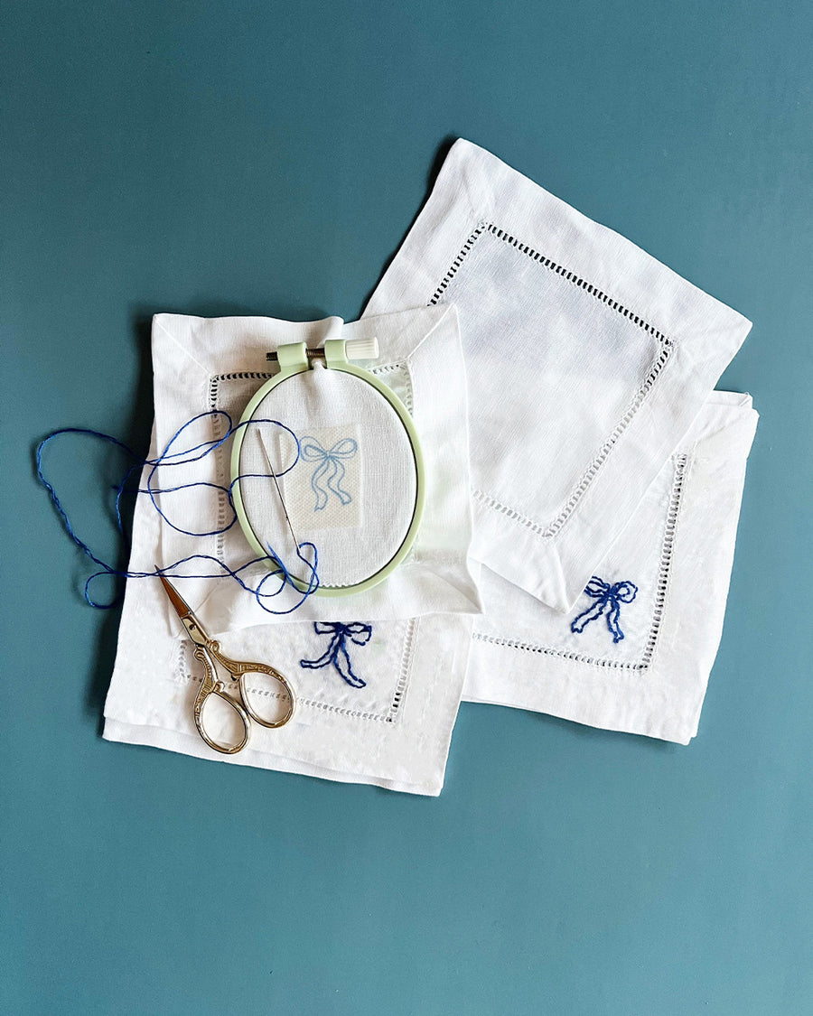 ribbon bow napkin embroidery set with embroidery ring, scissors, bow templates and dark blue embroidery tread