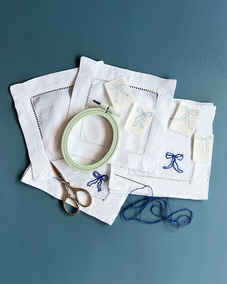 ribbon bow napkin embroidery set with embroidery ring, scissors, bow templates and dark blue embroidery tread