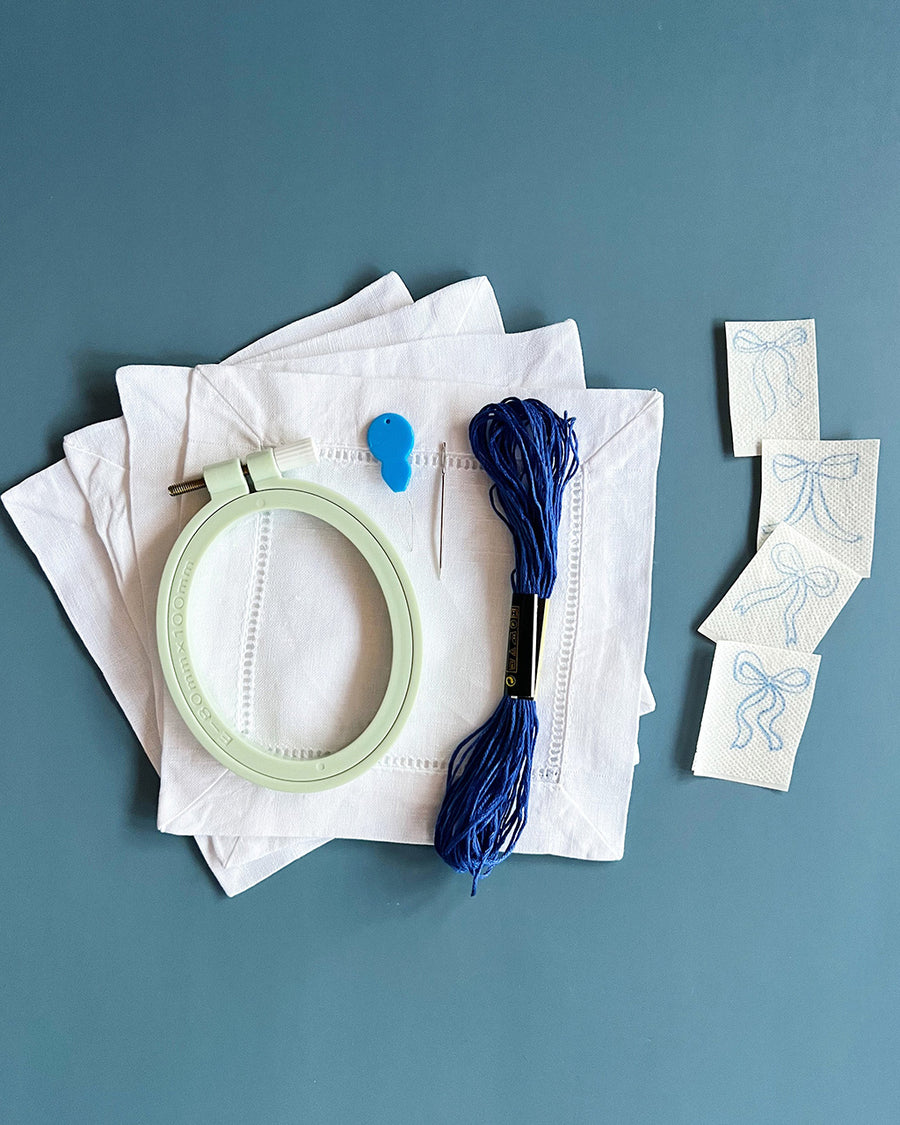 ribbon bow napkin embroidery set with embroidery ring, scissors, bow templates and dark blue embroidery tread