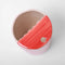 top view of white and coral diamond print coffee tumbler with red cherry print and red sipping top