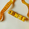 yellow measuring tape bow hair clip