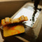 yellow measuring tape bow hair clip on a sewing machine