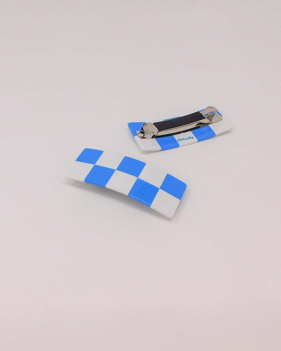 front and back view of blue and white checkered hair clip
