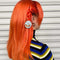 model wearing blue ponytail elastic with realistic circular fish bowl print medallion.
