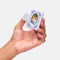 model holding periwinkle hair claw with blue ribbon border and cutout to place a photo