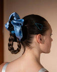model wearing black and blue large silk scrunchie