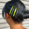 model wearing set of four hair clips: lime green wavy, lime green straight, black and white stripe wavy, and black and white stripe straight