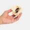 model holding model wearing cream claw clip with peach dainty flowers and photo inside
