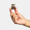 model holding mini brown and black leopard print hair claw