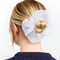 model wearing scrunchie with green coil band and white organza