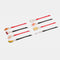 scattered black and red bobby pins with dangling picnic charms