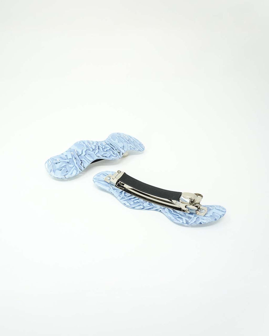 front and back of frosty blue wavy hair clip
