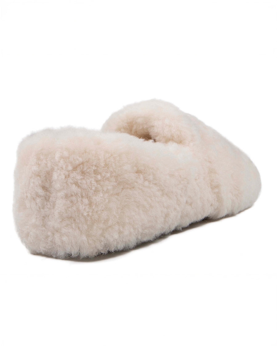 backview of cream fuzzy slip-on slippers