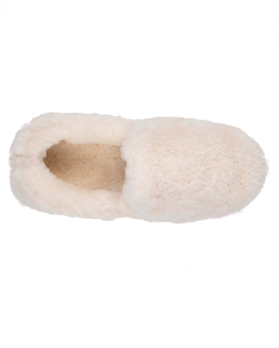 top view of cream fuzzy slip-on slippers