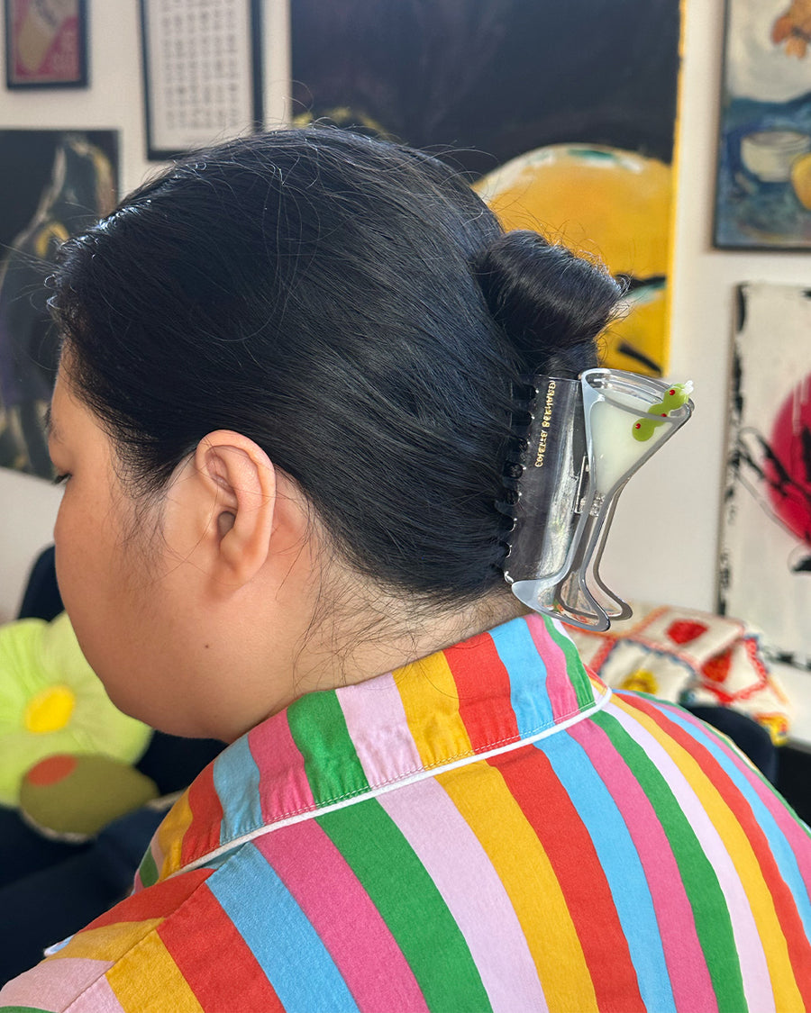 model wearing martini glass hair claw