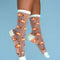 model wearing sheer socks with clownfish print and white trim