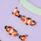 up close of sheer socks with clownfish print and white trim