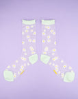sheer crew socks with all over daisy print and white trim