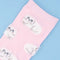 up close of pink socks with all over white persian cat print