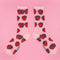 sheer socks with all over strawberry print and pink trim