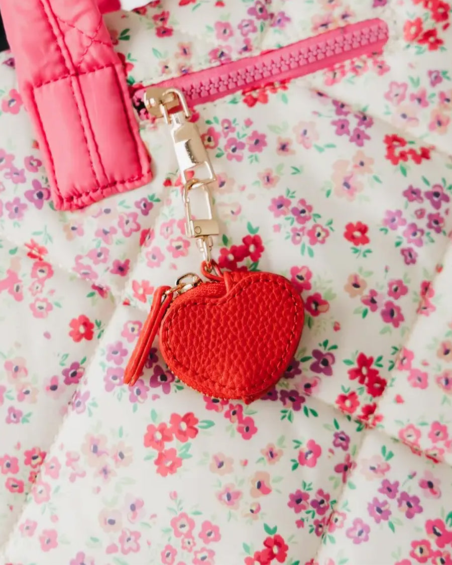 red heart keychain charm on a bag