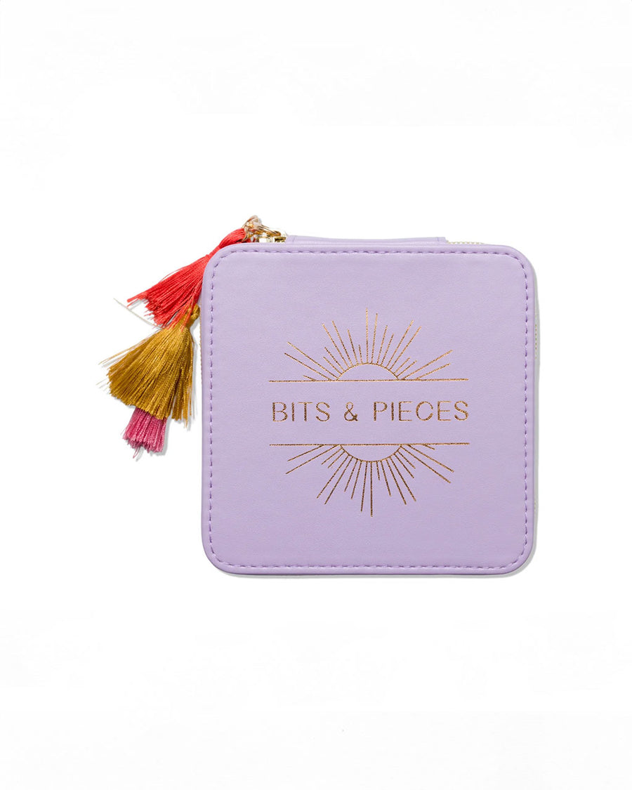 purple jewelry case with multicolor tassel and gold 'bits & pieces' across the front