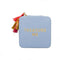 light blue jewelry case with multicolor tassel and gold 'treasure me' across the front