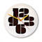 white round wall clock with large black numbers with yellow and red hands