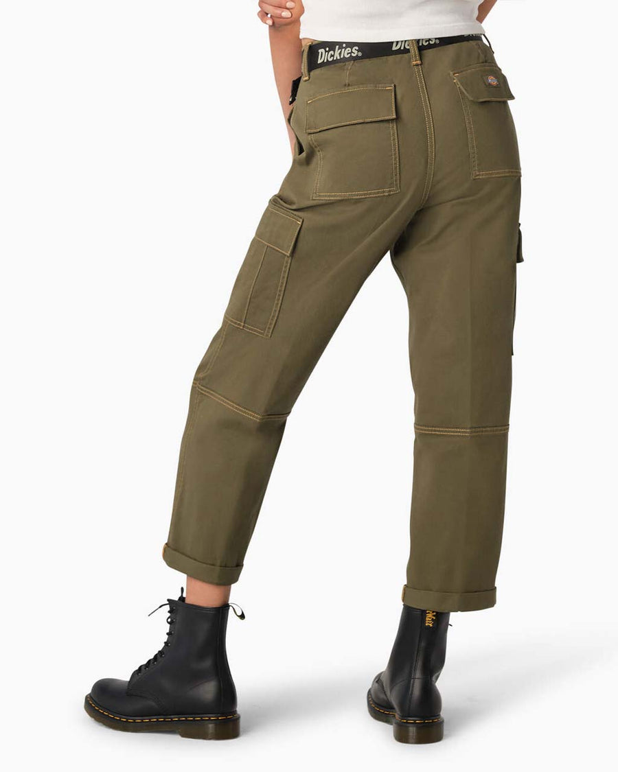 back view of model wearing dark olive green cargo pants with green contrast stitching and black dickies belt