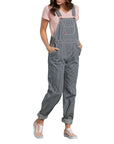 model wearing grey and white pinstripe overalls