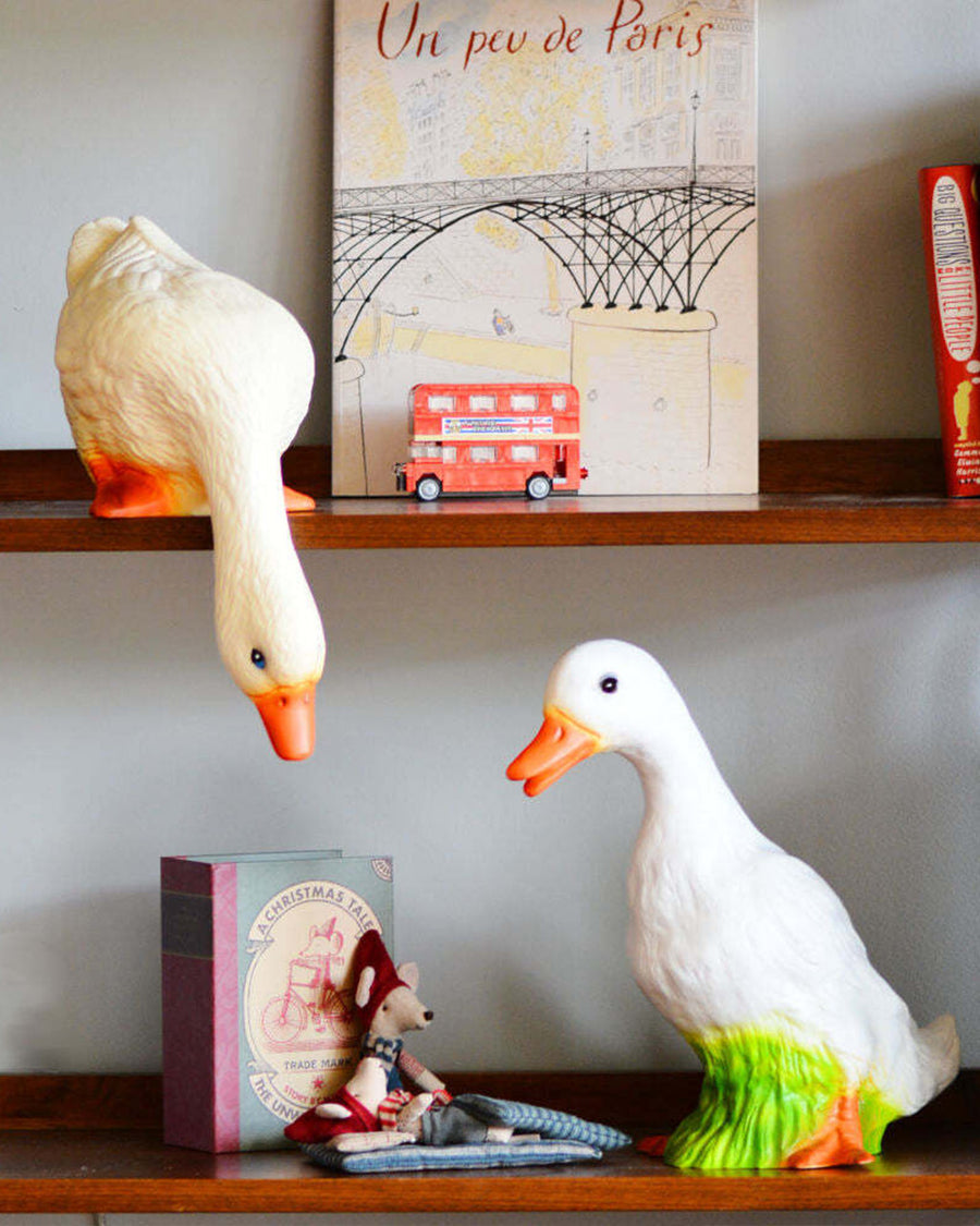 white duck lamp and white duck looking down lamp