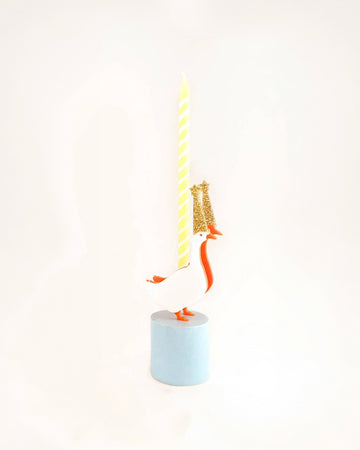 candle holder with light blue stand and goose with gold glitter party hat