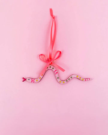 light pink snake wooden ornament