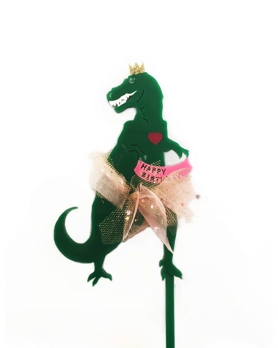 green t-rex cake topper with tulle tutu and happy birthday banner